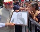 Modi breaks security protocol to accept mother’s portrait in Shimla